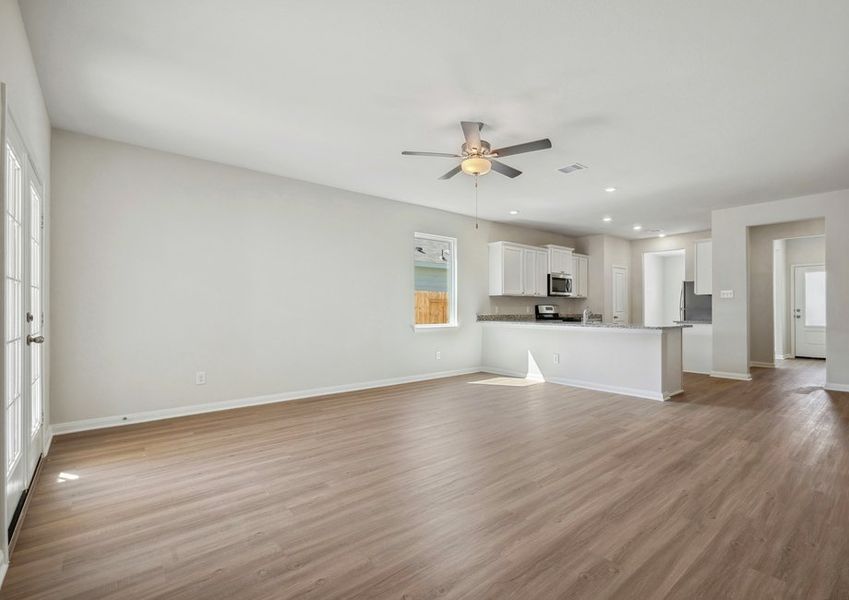 Exceptional family room and adjoining kitchen Exceptional family room and adjoining kitchen