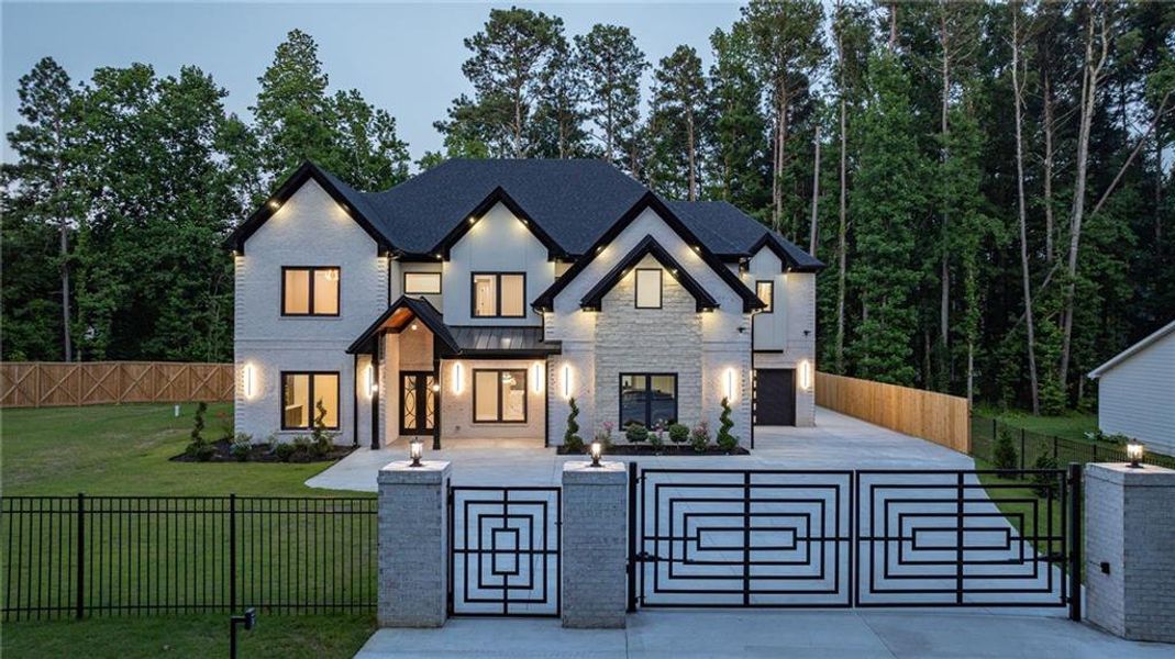 Front exterior of a new home in , Lawrenceville, GA, highlighting curb appeal (Image 2). Front exterior of a new home in , Lawrenceville, GA, highlighting curb appeal (Image 2).