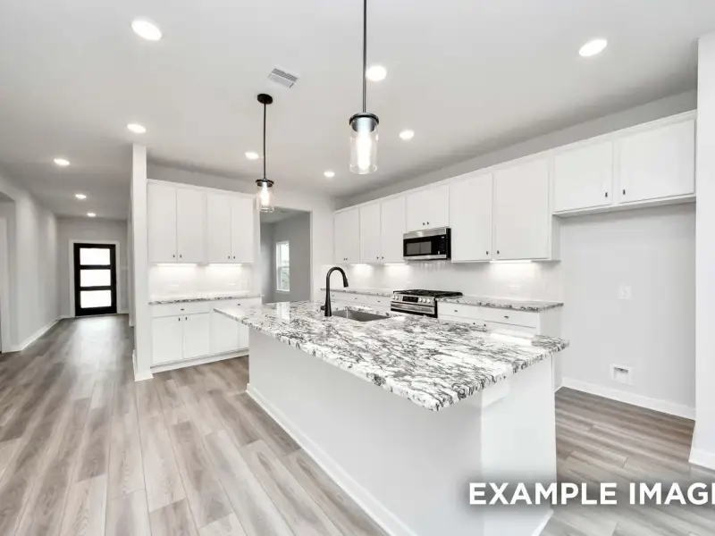 Furnished interior view inside a new home in Sundance Cove, Crosby (Image 11).