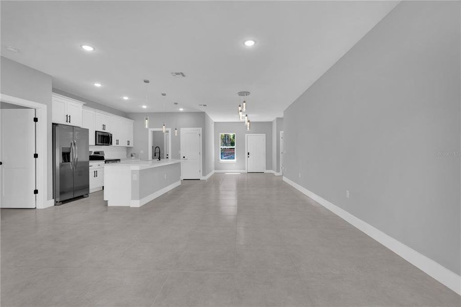 Spacious, unfurnished interior of a new home in , Port Charlotte (Image 21).