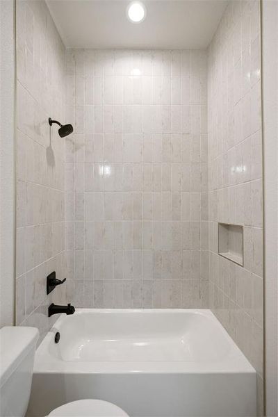 Bathroom with toilet and washtub / shower combination