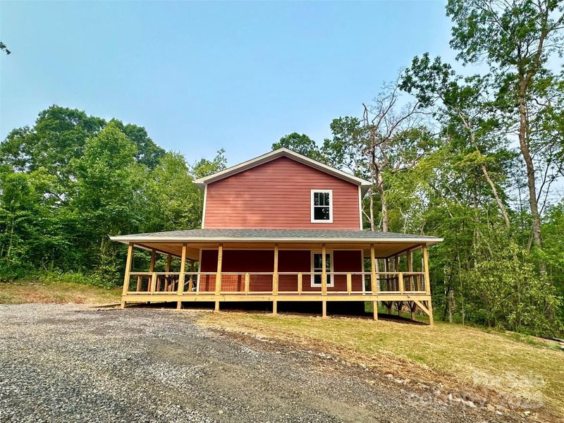 Front exterior of a new home in , Fairview, NC, highlighting curb appeal (Image 24).