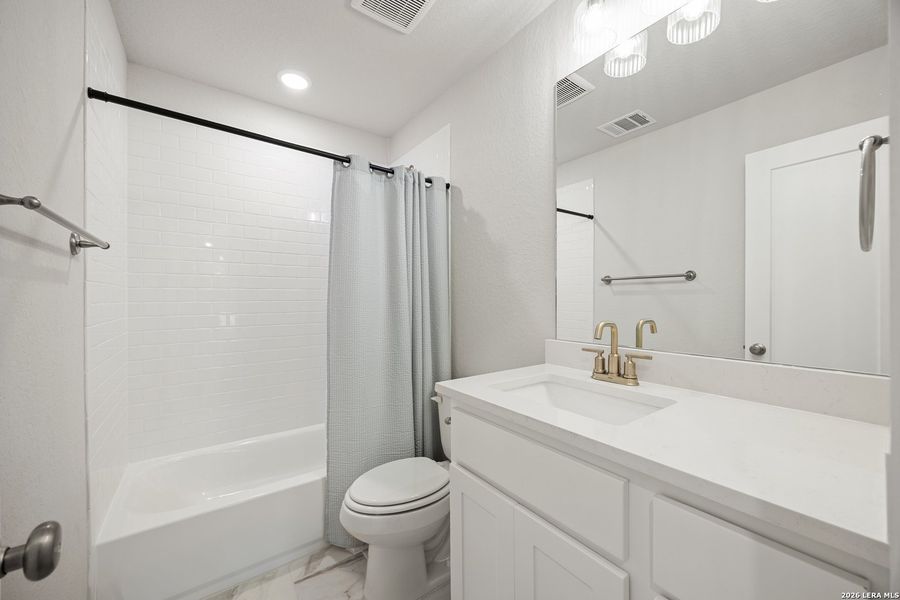 Furnished interior view inside a new home in Ventana, Bulverde (Image 9).