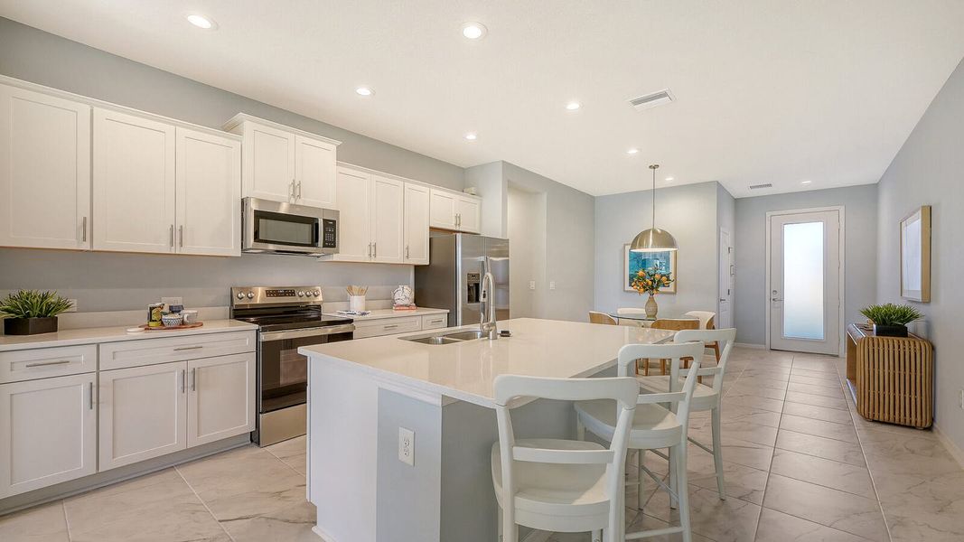 Furnished interior view inside a new home in Grand Park Real Estate and Homes for Sale in Sarasota, FL - Neal Communities, Sarasota (Image 13).