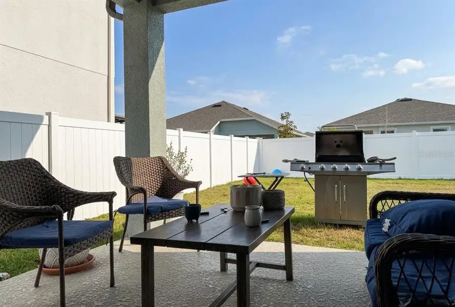 Exterior details and patio area of a home in Prairie Oaks, St. Cloud (Image 3).