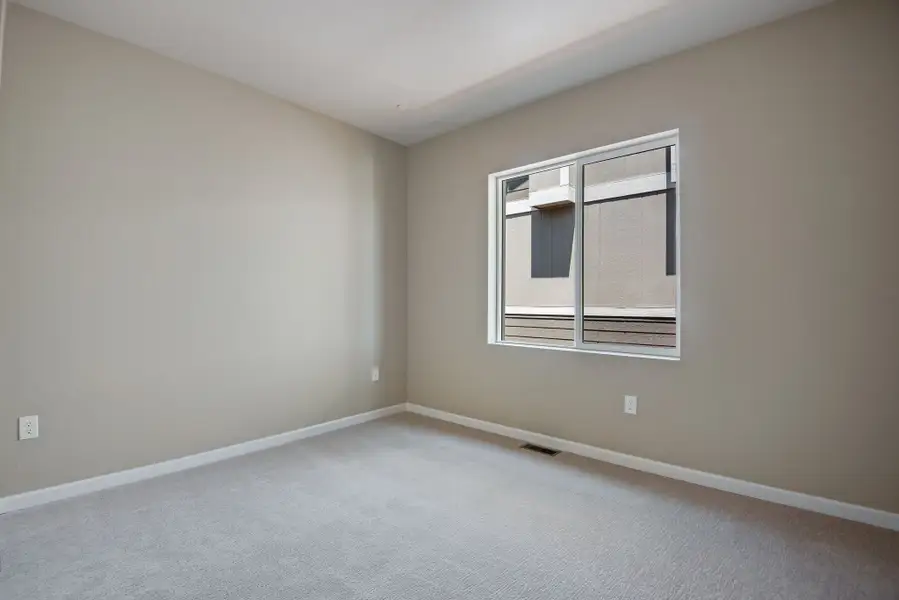 Spacious, unfurnished interior of a new home in Reunion, Commerce City (Image 18).