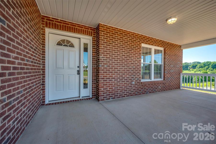 Exterior details and patio area of a home in , Spindale (Image 21).