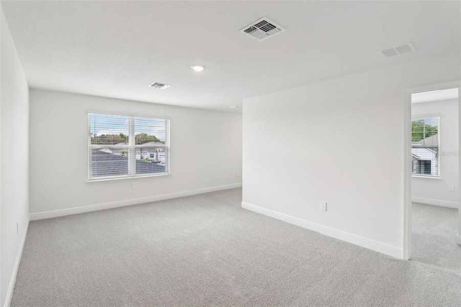 Spacious, unfurnished interior of a new home in The Reserve at Hammock Oaks - Classic Series, Lady Lake (Image 16). Spacious, unfurnished interior of a new home in The Reserve at Hammock Oaks - Classic Series, Lady Lake (Image 16).