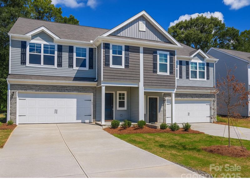 Front exterior of a new home in , Charlotte, NC, highlighting curb appeal (Image 2). Front exterior of a new home in , Charlotte, NC, highlighting curb appeal (Image 2).