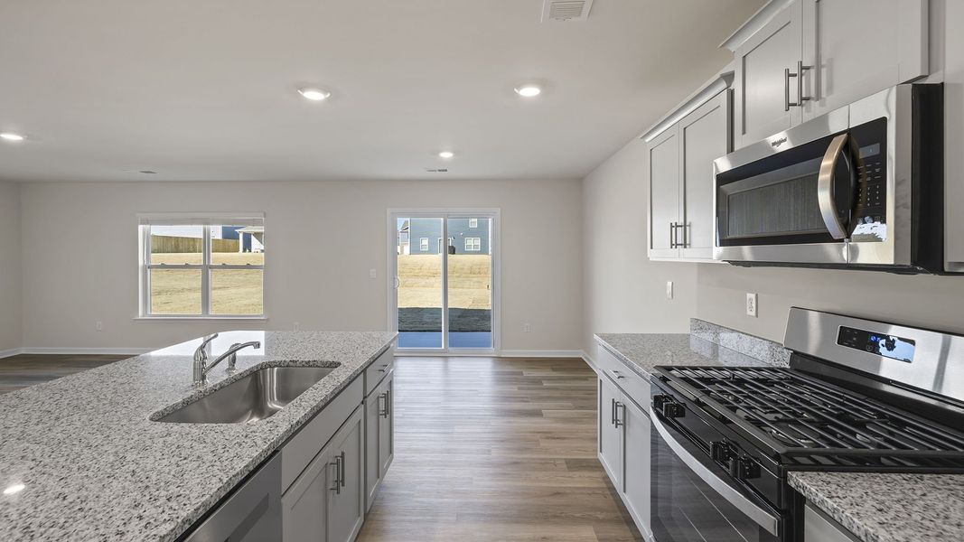Furnished interior view inside a new home in Bentley Park, Greenwood (Image 8).