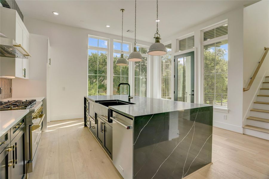 Another angle of the island kitchen from the butler's pantry. Another angle of the island kitchen from the butler's pantry.