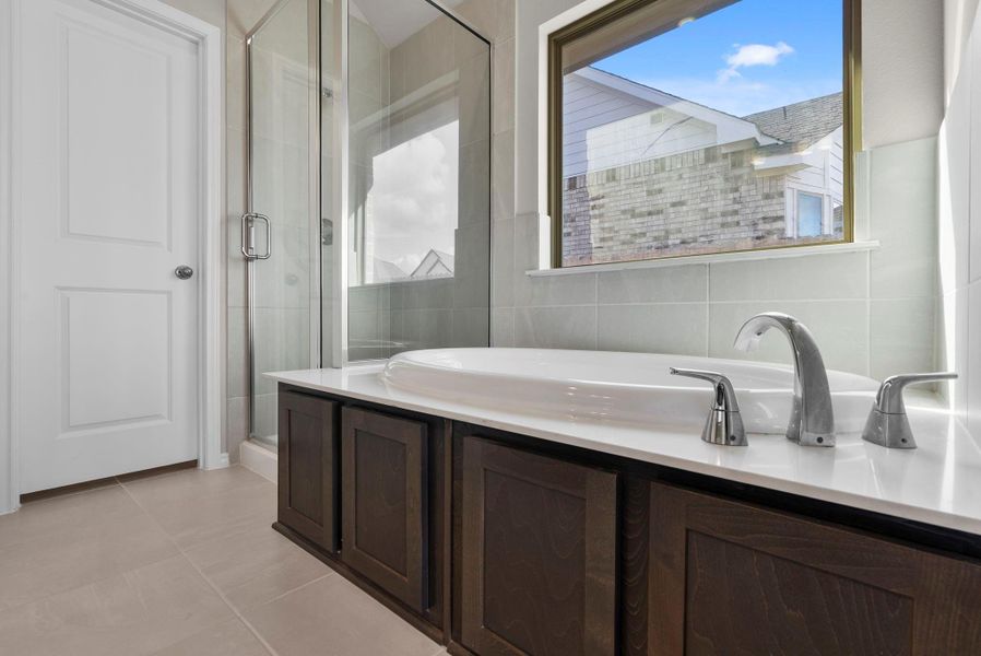 Furnished interior view inside a new home in Grand Central Park, Conroe (Image 11).