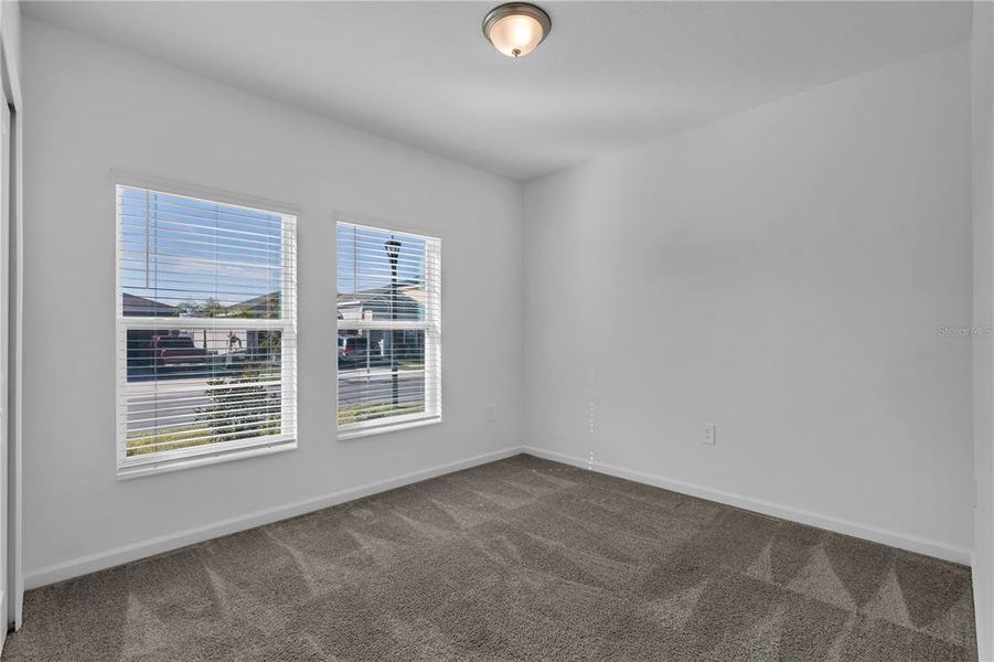 Spacious, unfurnished interior of a new home in Knightsbridge, Kissimmee (Image 24).