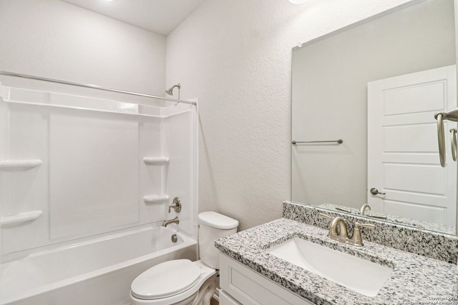 Furnished interior view inside a new home in Magnolia Village North, San Antonio (Image 7).
