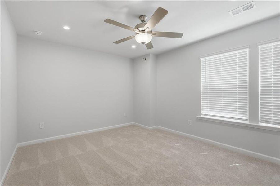 Spacious, unfurnished interior of a new home in Berkeley Mill, Cumming (Image 20).