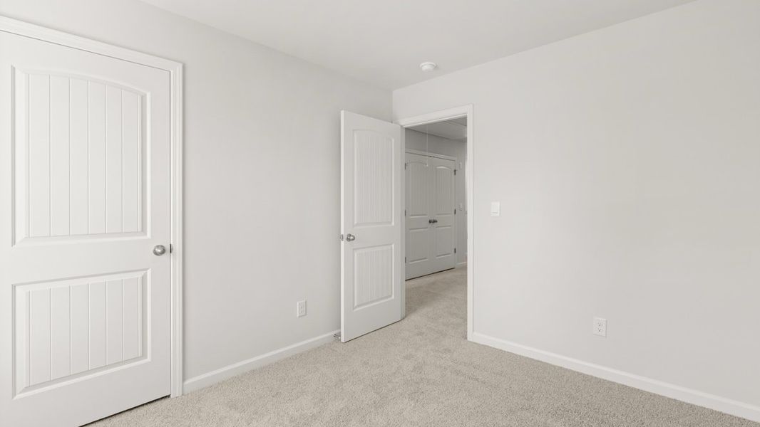 Spacious, unfurnished interior of a new home in Carlton, Douglasville (Image 29).