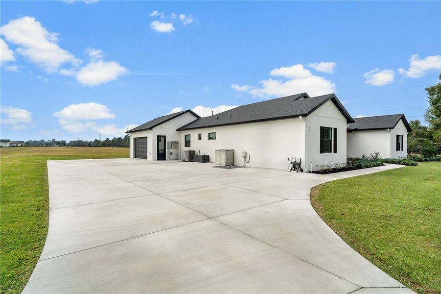 Front exterior of a new home in , Tavares, FL, highlighting curb appeal (Image 23).
