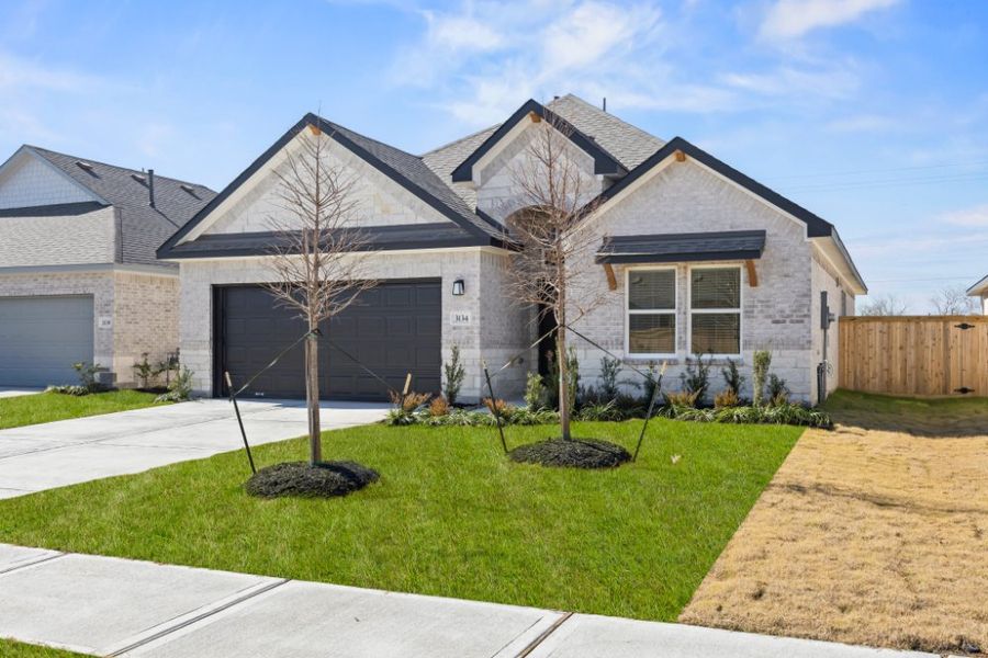 Representative exterior photo of a completed home built from the Myrtle 1687HS by Saratoga Homes in Ashland, Angleton, TX (Image 18). Representative exterior photo of a completed home built from the Myrtle 1687HS by Saratoga Homes in Ashland, Angleton, TX (Image 18).