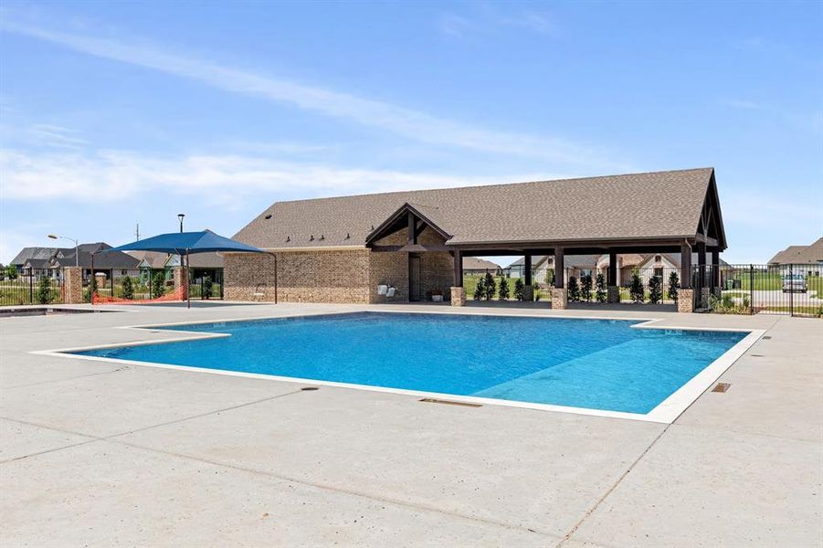 Community pool with a patio Community pool with a patio