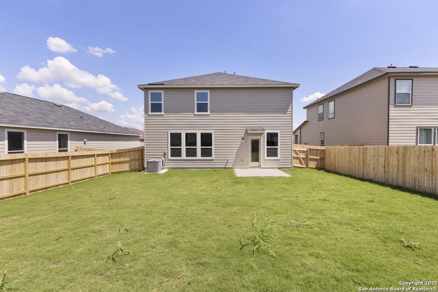 Front exterior of a new home in Woodside Farms, Seguin, TX, highlighting curb appeal (Image 18). Front exterior of a new home in Woodside Farms, Seguin, TX, highlighting curb appeal (Image 18).