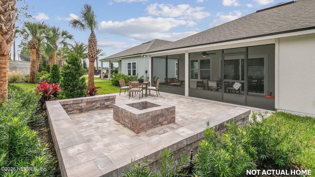 Exterior details and patio area of a home in Sawmill Branch, Palm Coast (Image 3).