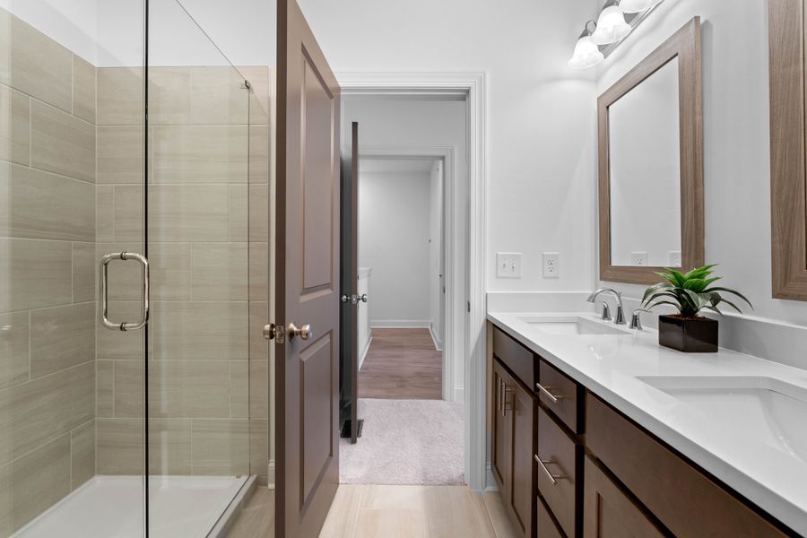 Representative furnished interior of a home built from the The Oleander by The Providence Group in Market Square at Sawnee Village, Cumming (Image 32).