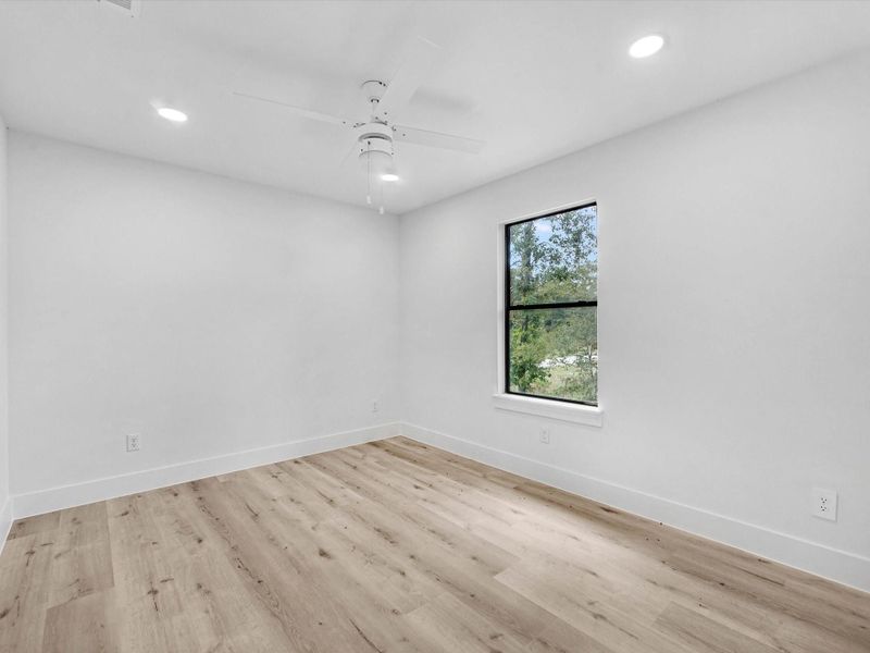 secondary bedrooms all feature a ceiling fan for extra comfort and custom closets.