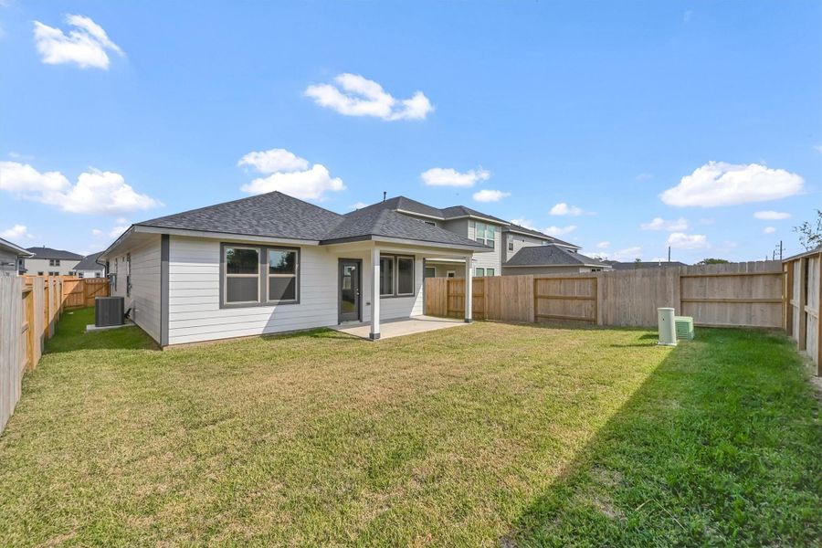 Exterior details and patio area of a home in La Segarra 40', Brookshire (Image 26). Exterior details and patio area of a home in La Segarra 40', Brookshire (Image 26).