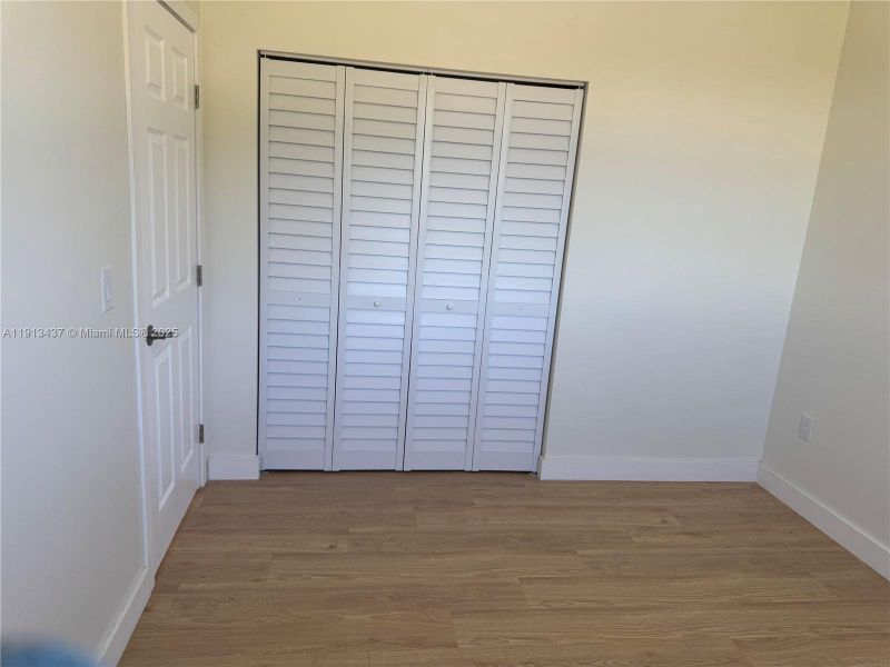 Spacious, unfurnished interior of a new home in , Port Charlotte (Image 18).