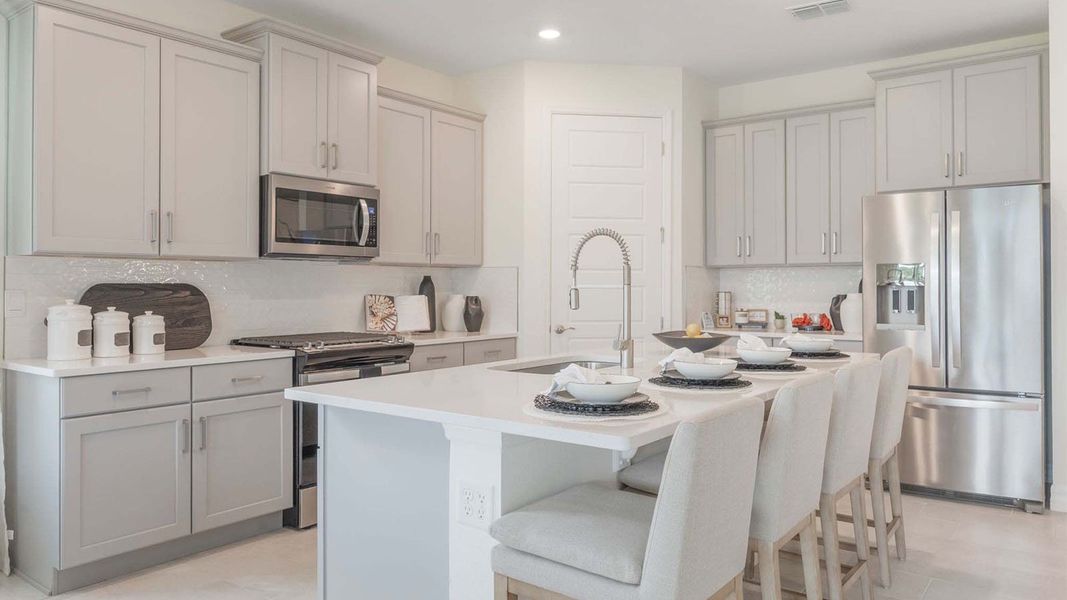 Representative furnished interior of a home built from the DELRAY by D.R. Horton in Lakes of Mount Dora, Mount Dora (Image 11).