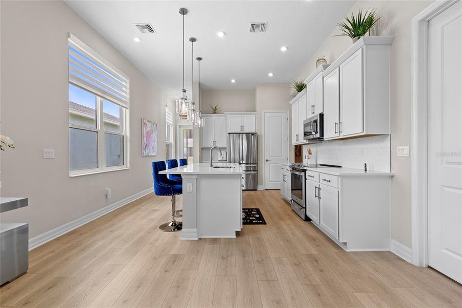 Furnished interior view inside a new home in The Reserve at Victoria, Deland (Image 24).