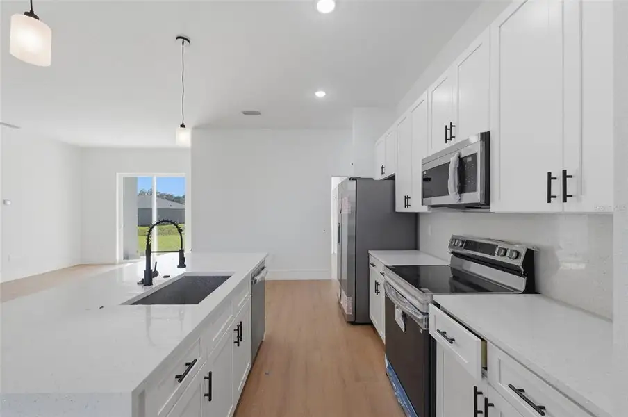 Furnished interior view inside a new home in , Ocala (Image 9).