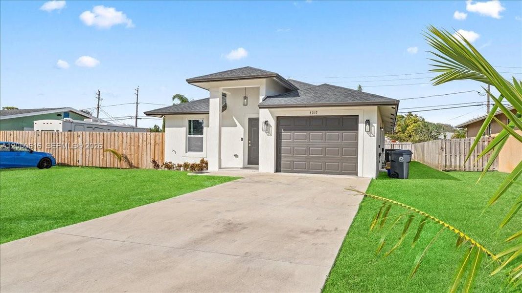 Front exterior of a new home in , West Palm Beach, FL, highlighting curb appeal (Image 20).