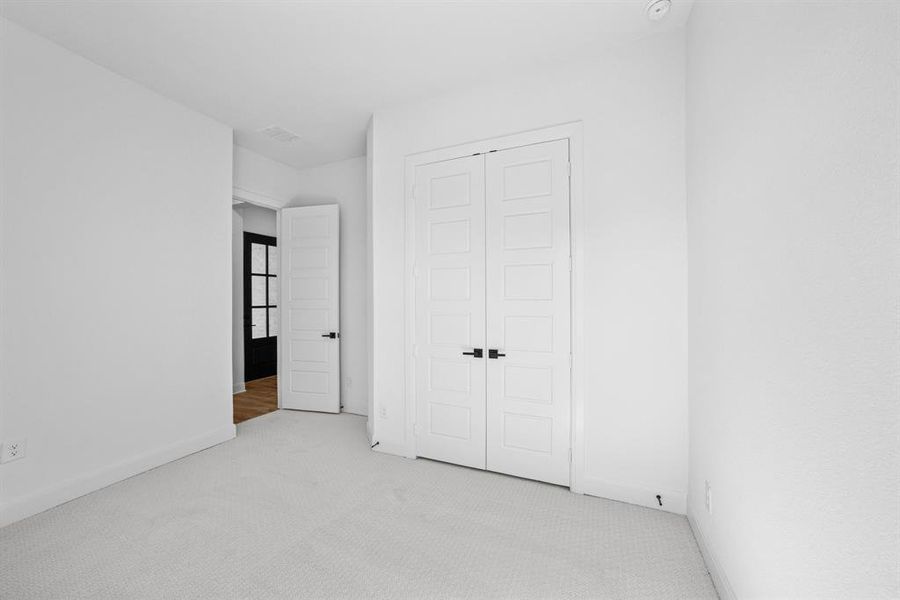 Spacious, unfurnished interior of a new home in Pecan Square - Gardens, Northlake (Image 27). Spacious, unfurnished interior of a new home in Pecan Square - Gardens, Northlake (Image 27).