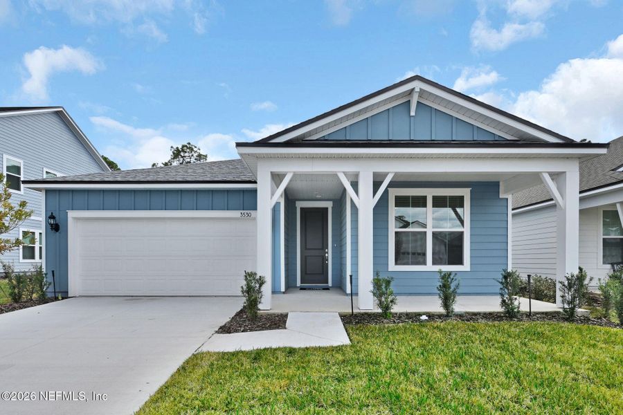 Front exterior of a new home in Hyland Trail, Green Cove Springs, FL, highlighting curb appeal (Image 20).