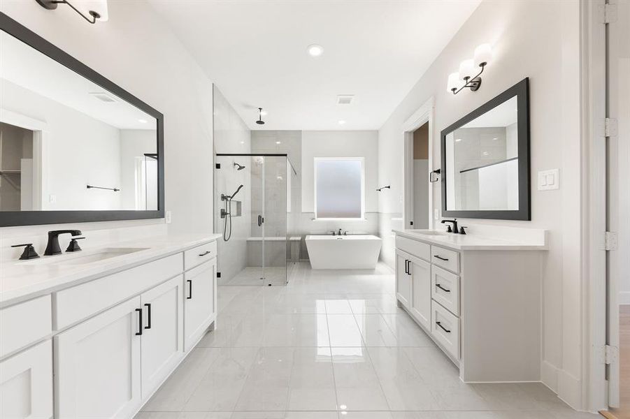With beautiful finishes and plenty of space, this over the top owner's bath was designed with two in mind.