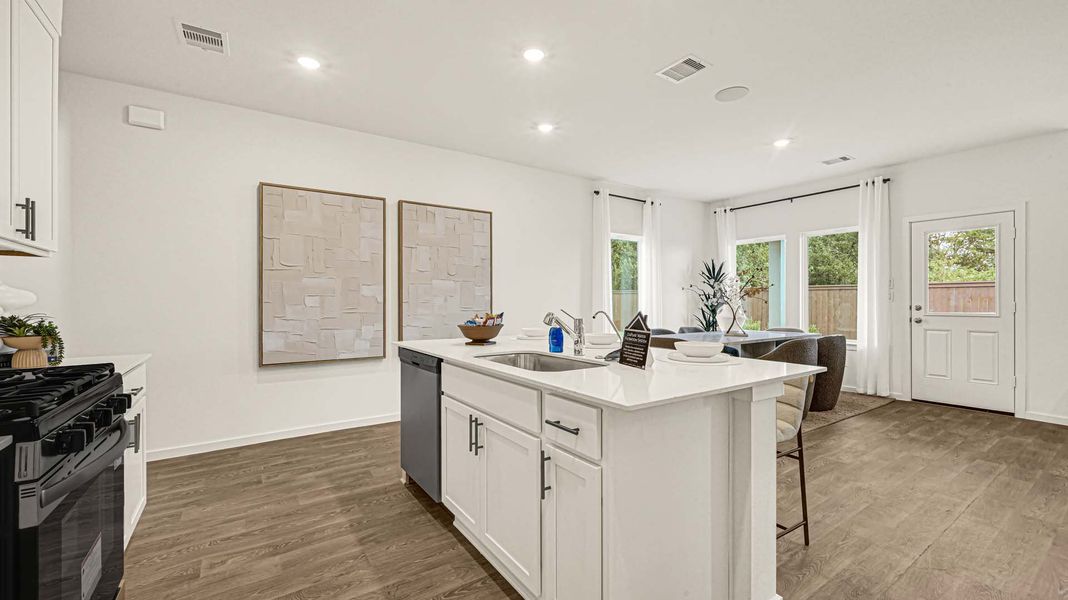 Representative furnished interior of a home built from the Sally by D.R. Horton in August Trails, Needville (Image 7).