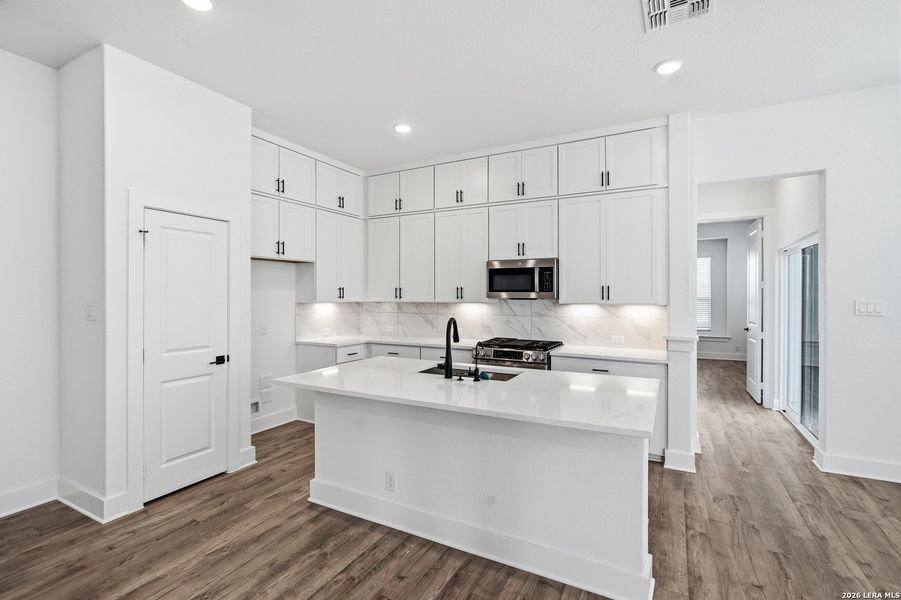 Furnished interior view inside a new home in Prominence, San Antonio (Image 9).