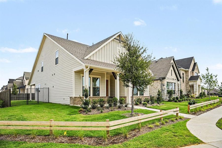 Front exterior of a new home in , Venus, TX, highlighting curb appeal (Image 22).