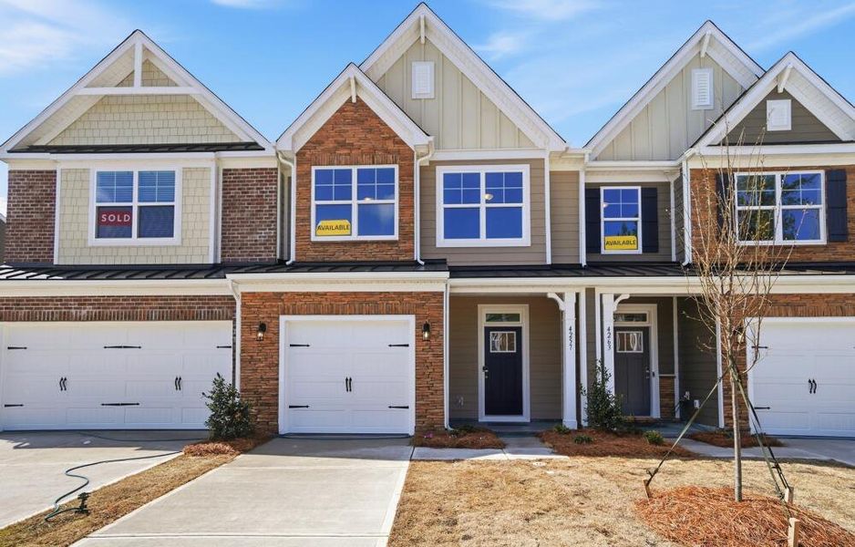 Front exterior of a new home in Harrisburg Village Townhomes, Harrisburg, NC, highlighting curb appeal (Image 2).