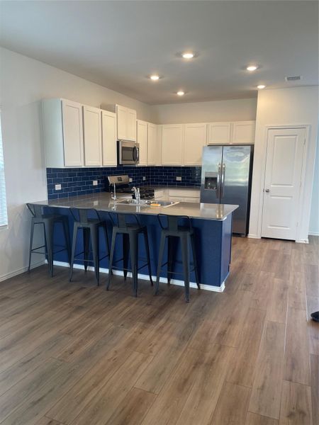 Kitchen open to living and dining Kitchen open to living and dining