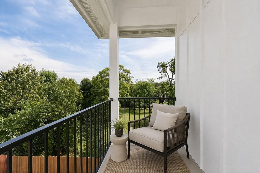 Private balcony off the primary bedroom—perfect for enjoying fresh air and peaceful views.