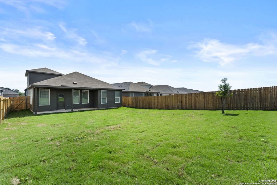 Exterior details and patio area of a home in Parkside: Coastline Collection, New Braunfels (Image 2).