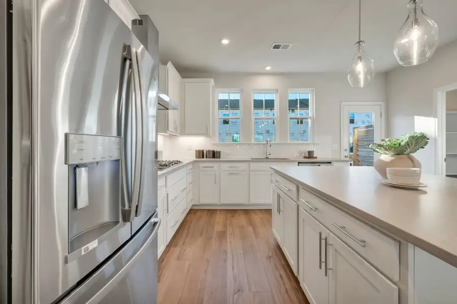 Representative furnished interior of a home built from the Nola by Tri Pointe Homes in Twinleaf Townes, Chapel Hill (Image 6).