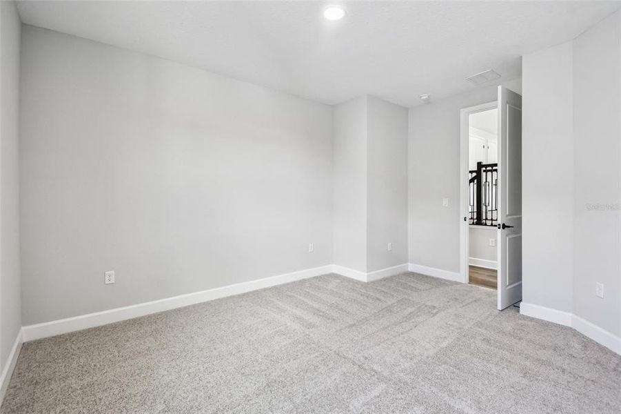 Spacious, unfurnished interior of a new home in Solace at Corner Lake, Orlando (Image 45).