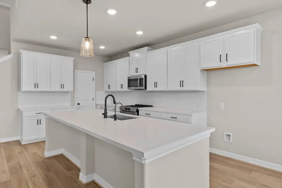 Kitchen. Sample product photo. Actual exterior and interior selections may vary by homesite. Photo may be virtually staged.