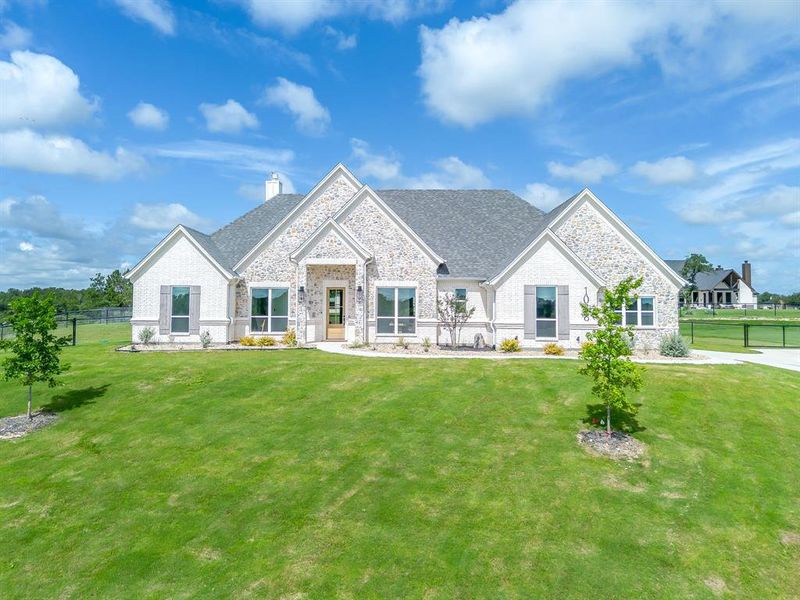 Front exterior of a new home in , Azle, TX, highlighting curb appeal (Image 25).