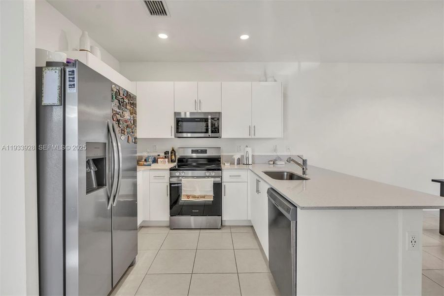 Furnished interior view inside a new home in , Coral Springs (Image 11).