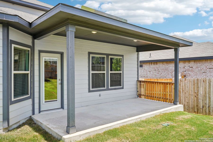 Front exterior of a new home in Comanche Ridge, San Antonio, TX, highlighting curb appeal (Image 21). Front exterior of a new home in Comanche Ridge, San Antonio, TX, highlighting curb appeal (Image 21).