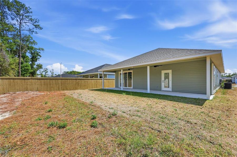 Exterior details and patio area of a home in Grand Oaks, Gainesville (Image 4).